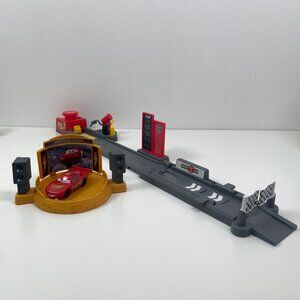 Disney and Pixar Cars Piston Cup Jump and Stunt Runway Playset